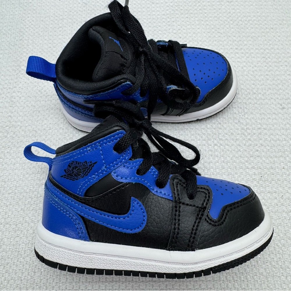 Air Jordan 1 Mid TD in the "Black Royal Blue" or "Hyper Royal" Infant size 5C